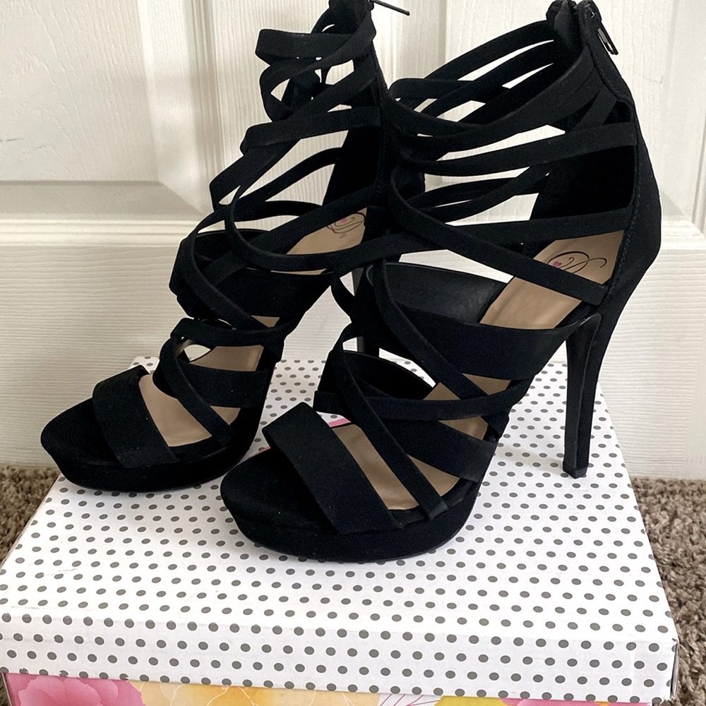 Black Strappy platform heels.
